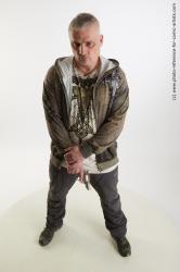 Yury Foghting Pose With Gun